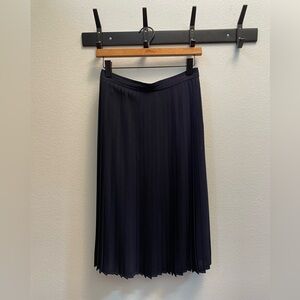 Navy pleated midi skirt by J Crew
